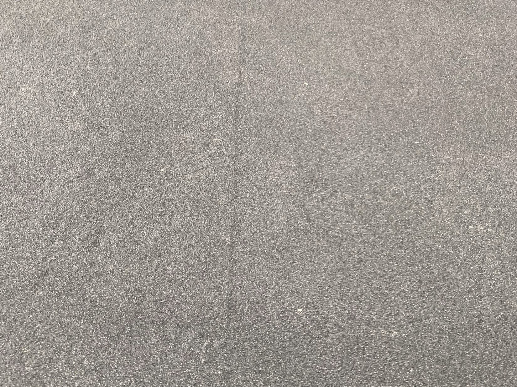 Close-up of an Atlas Epoxy driveway overlay finish